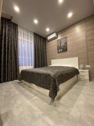 Апартаменты Soul City Apart Hotel Днепр Улучшенный четырехместный номер-5